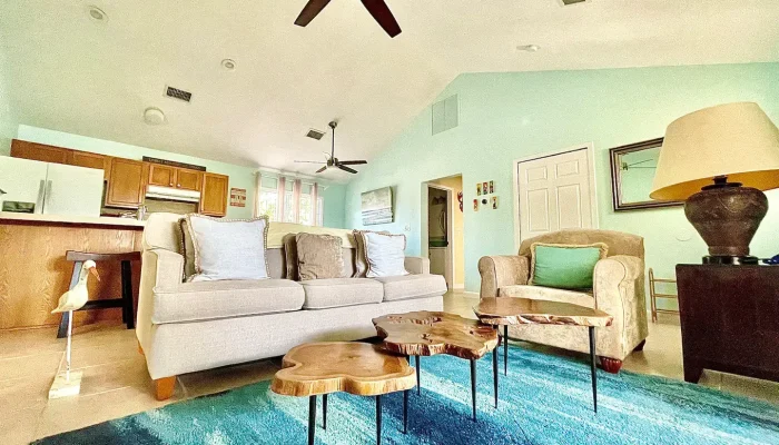 Spacious living room with modern furniture decor.